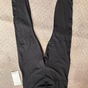 Athleta Black Ultimate Stash Pocket Tights